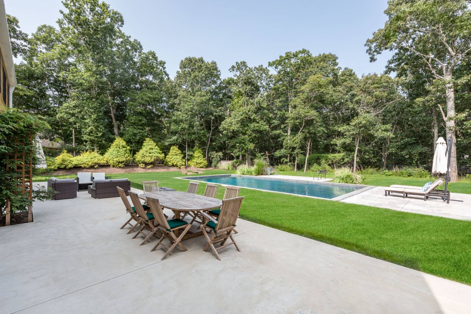 6 Landfall Circle East Hampton, NY 11937 - Photo 22 of 26 a view of a sitting area with furniture and garden