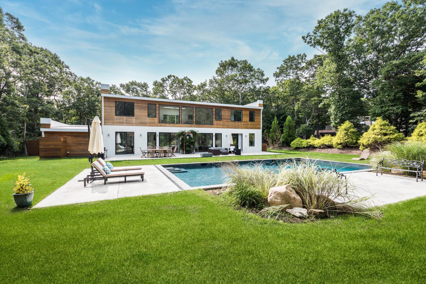 6 Landfall Circle East Hampton, NY 11937 - Photo 25 of 26 a view of house with swimming pool and yard