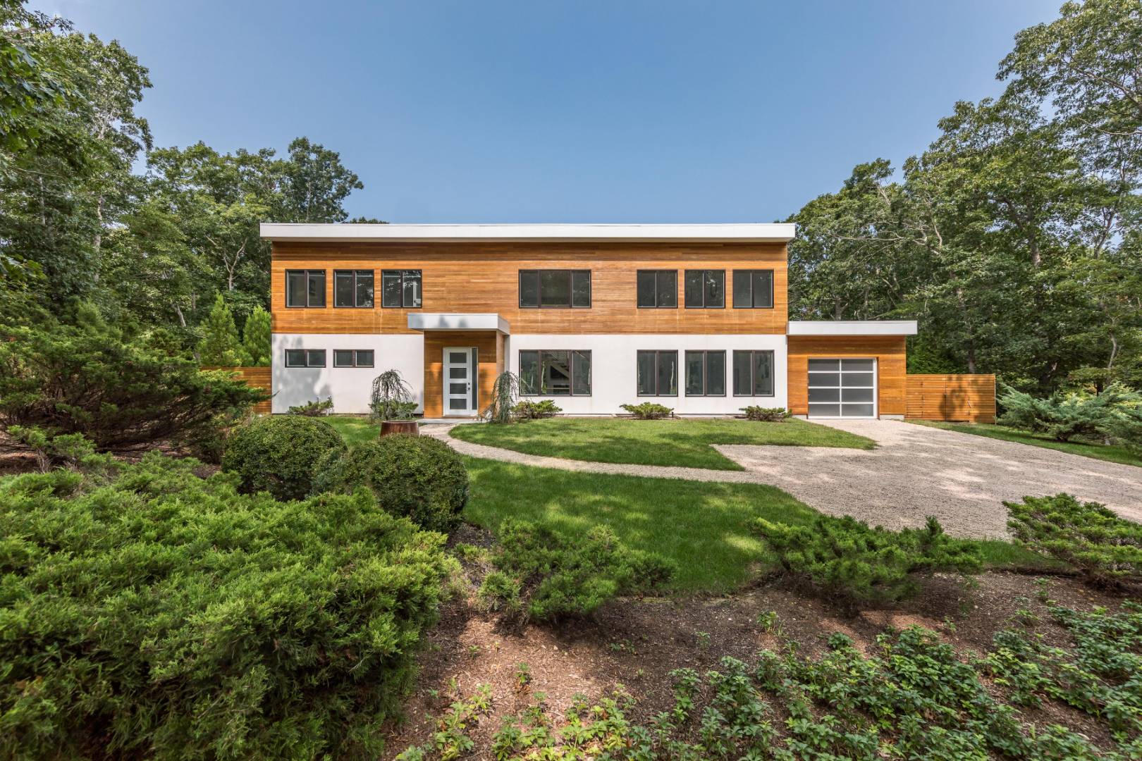 6 Landfall Circle East Hampton, NY 11937 - Photo 26 of 26 a front view of a house with a yard