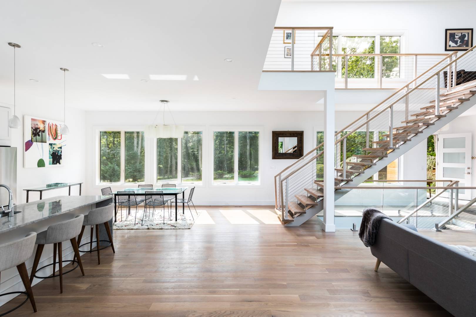 6 Landfall Circle East Hampton, NY 11937 - Photo 6 of 26 a living room with furniture or fireplace and a large window