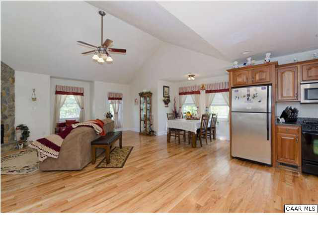 23 Stonefield Road Palmyra, VA 22963 - Photo 11 of 32 a living room with furniture and a wooden floor