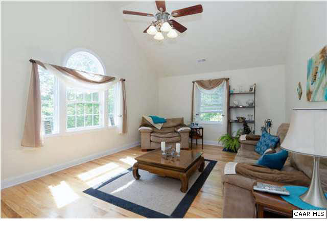 23 Stonefield Road Palmyra, VA 22963 - Photo 16 of 32 a living room with furniture and a window