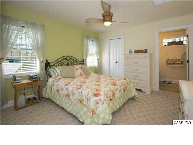 23 Stonefield Road Palmyra, VA 22963 - Photo 19 of 32 a living room with a bed furniture and a window