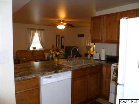 23 Stonefield Road Palmyra, VA 22963 - Photo 26 of 32 a kitchen with sink a window and cabinets