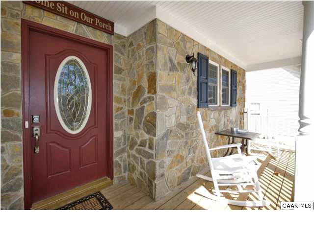 23 Stonefield Road Palmyra, VA 22963 - Photo 3 of 32 a view of a door and chair in the patio