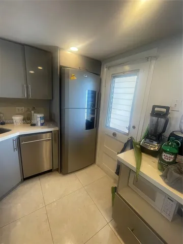 a utility room with washer and dryer