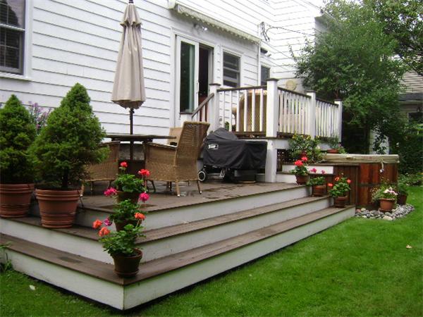 44 Sevinor Road Marblehead, MA 01945 - Photo 15 of 17 a view of a house with backyard sitting area and garden