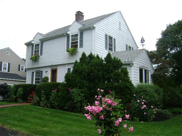 44 Sevinor Road Marblehead, MA 01945 - Photo 2 of 17 a front view of house and flowers and trees