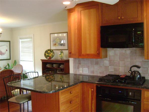 44 Sevinor Road Marblehead, MA 01945 - Photo 6 of 17 a kitchen with sink a stove and cabinets