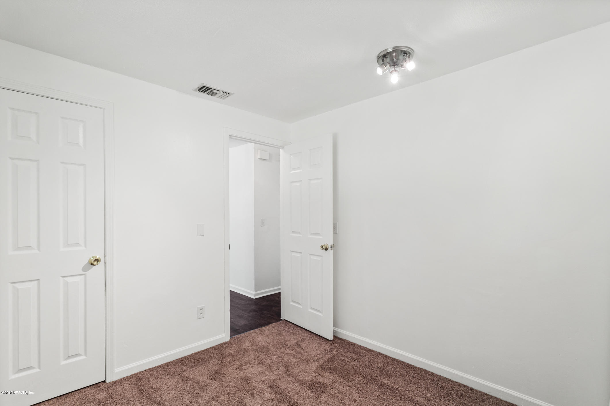 7163 Melvin Road Jacksonville, FL 32210 - Photo 24 of 33 a view of an empty room