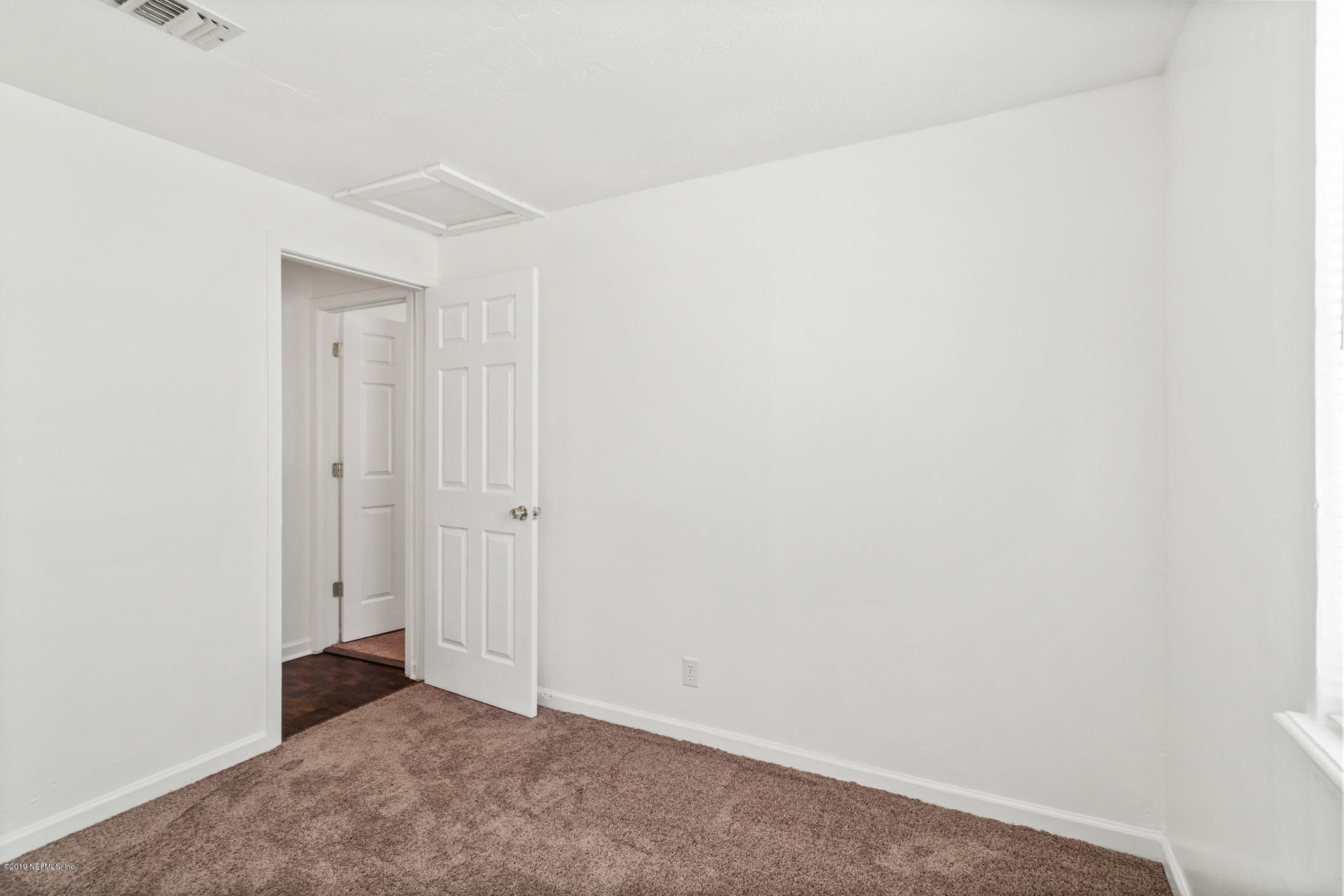 7163 Melvin Road Jacksonville, FL 32210 - Photo 27 of 33 a view of an empty room