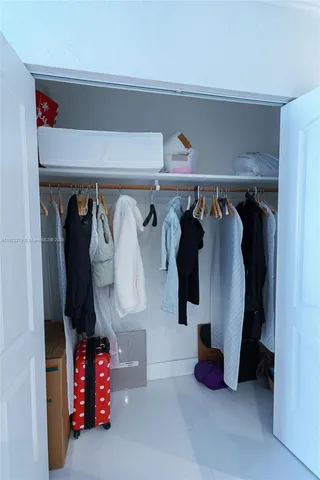 a close up view of walk in closet