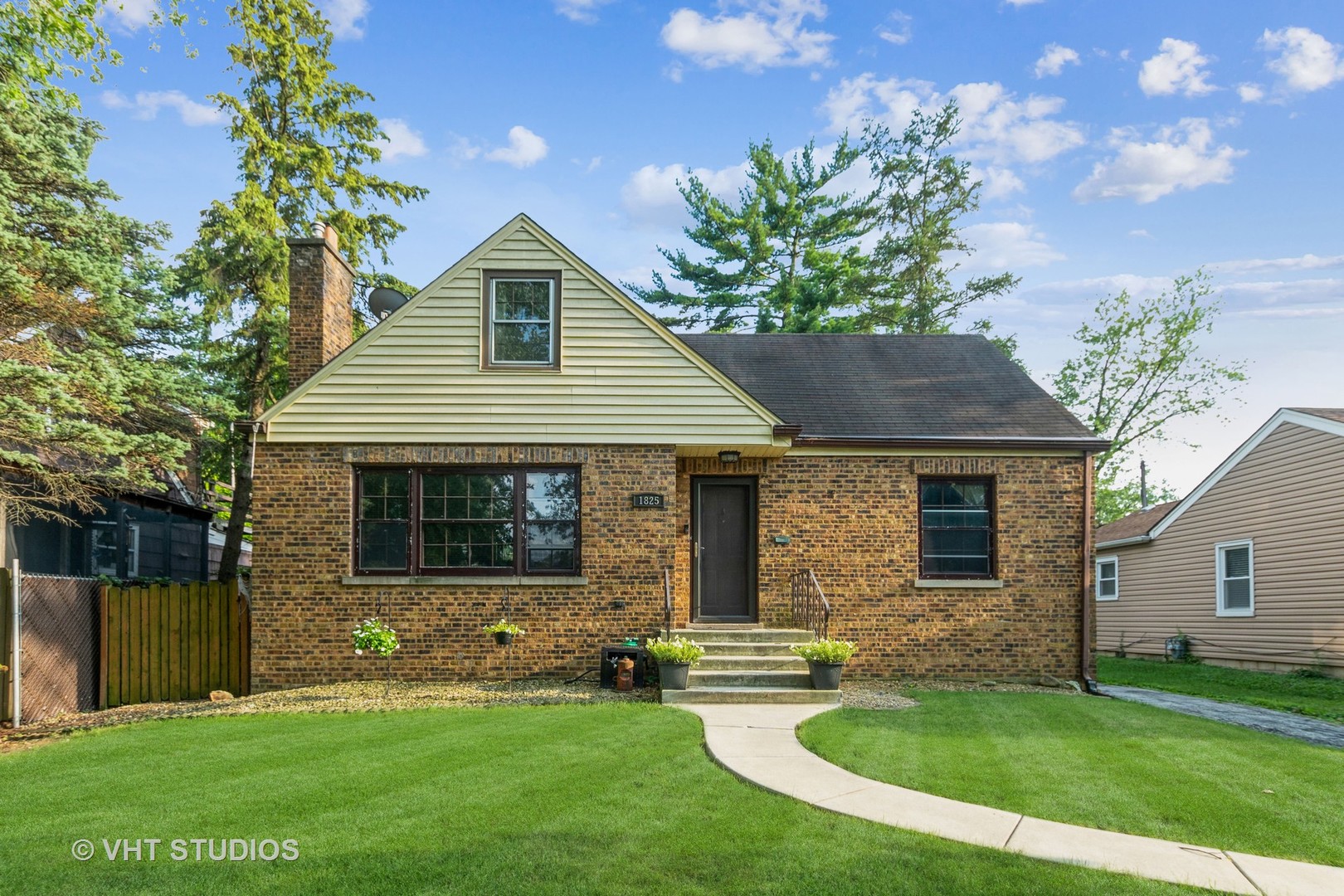 1825 Evergreen Road Homewood, IL 60430 - Photo 1 of 12 a front view of a house with a yard and porch