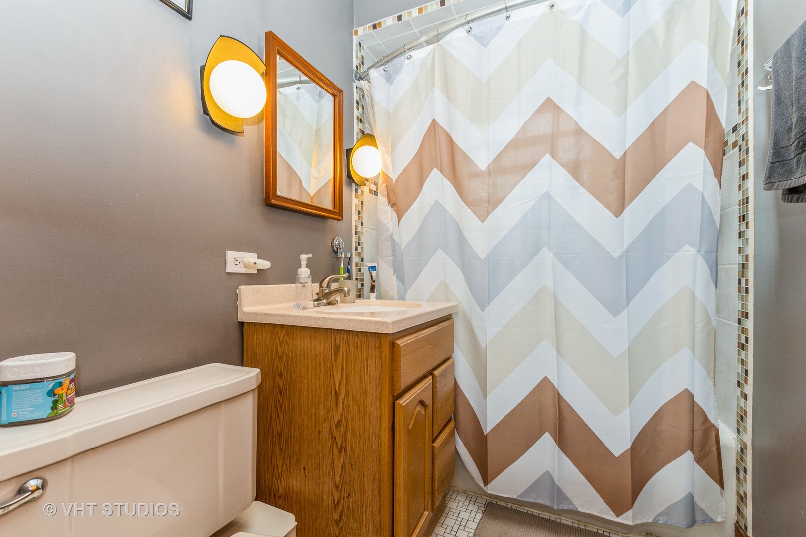 1825 Evergreen Road Homewood, IL 60430 - Photo 7 of 12 a bathroom with a sink a mirror and a toilet
