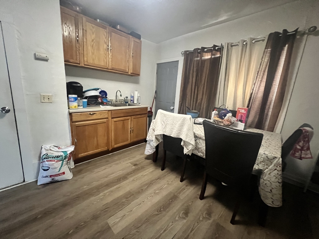 75 Intervale Street, Unit 1 Brockton, MA 02302 - Photo 6 of 11 a living room with stainless steel appliances furniture and a window