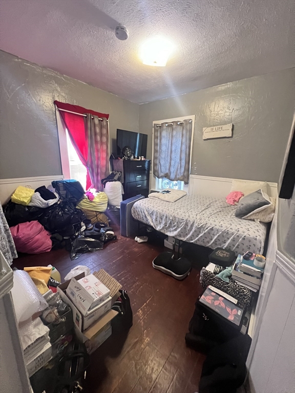 75 Intervale Street, Unit 1 Brockton, MA 02302 - Photo 8 of 11 a bedroom with furniture and a window