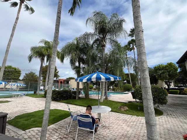 a view of a house with a garden