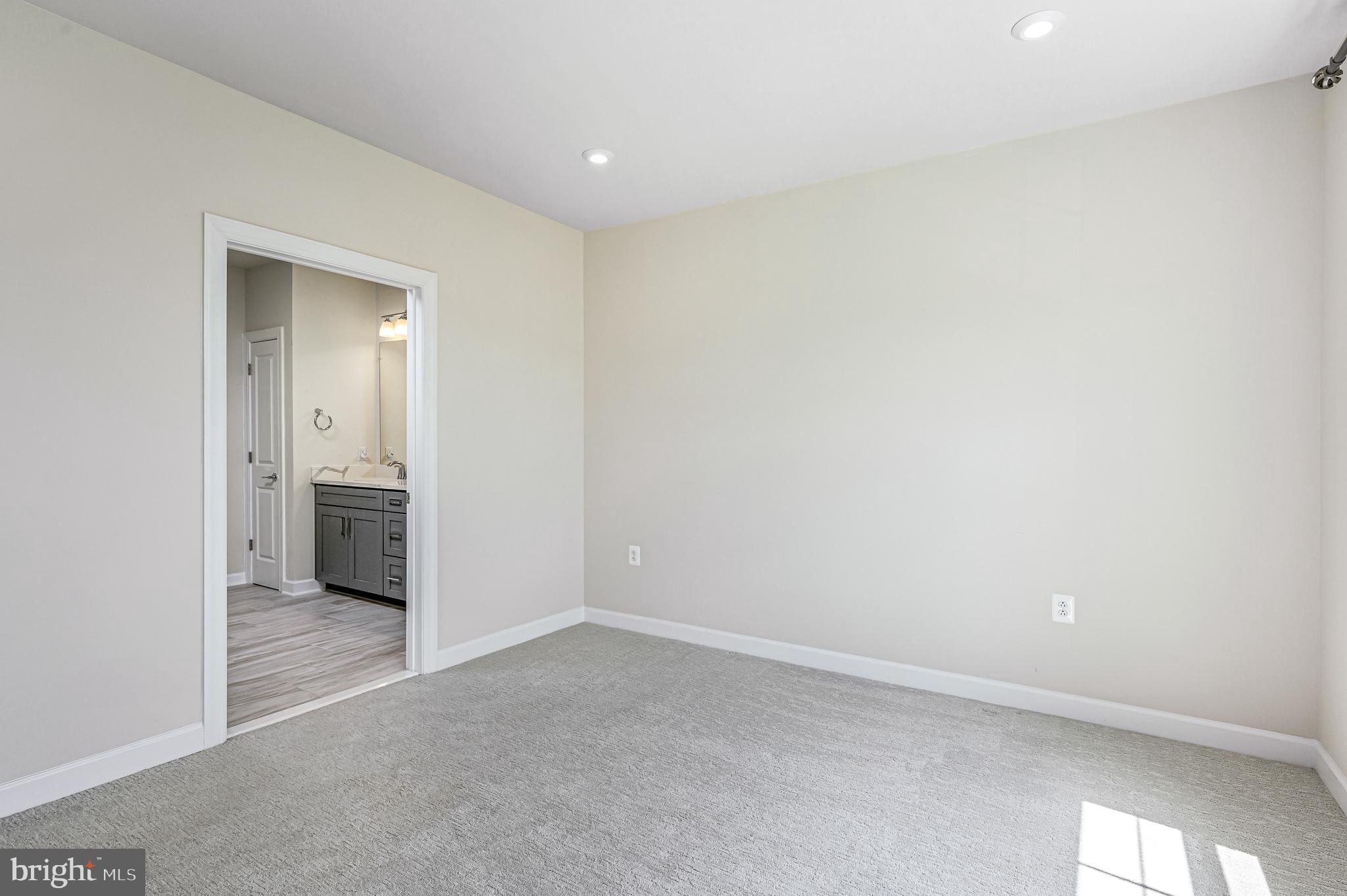 21894 Hawksbill High Circle, Unit 201 Sterling, VA 20164 - Photo 15 of 54 Owner's bedroom with ensuite bath