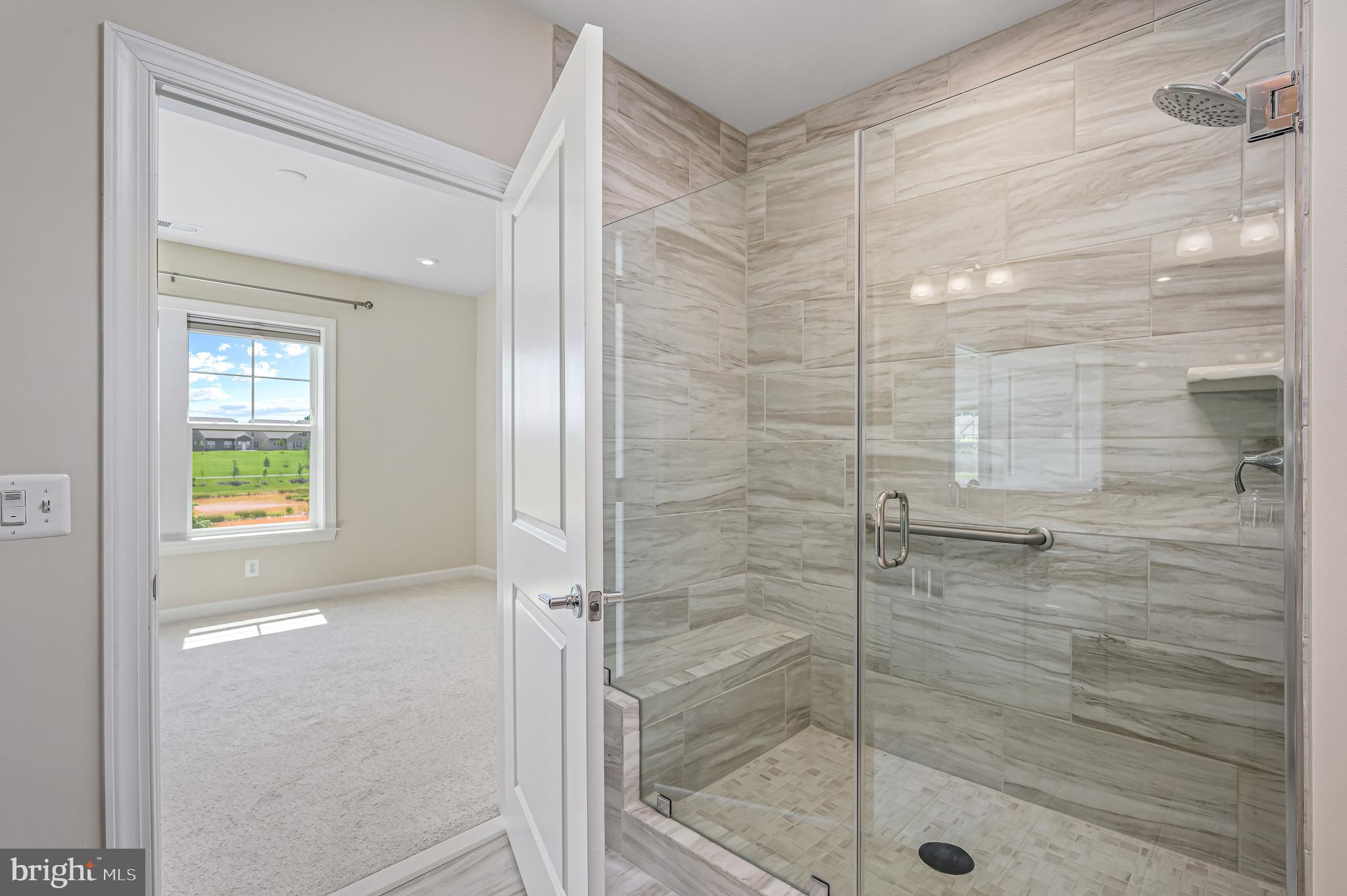 21894 Hawksbill High Circle, Unit 201 Sterling, VA 20164 - Photo 18 of 54 Gorgeous shower with bench!