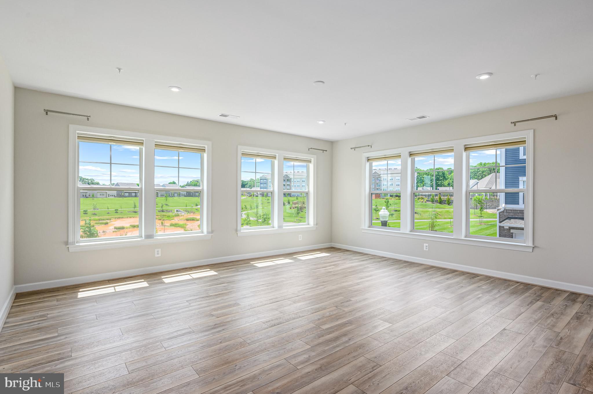 21894 Hawksbill High Circle, Unit 201 Sterling, VA 20164 - Photo 2 of 54 Spacious Living/Dining Area