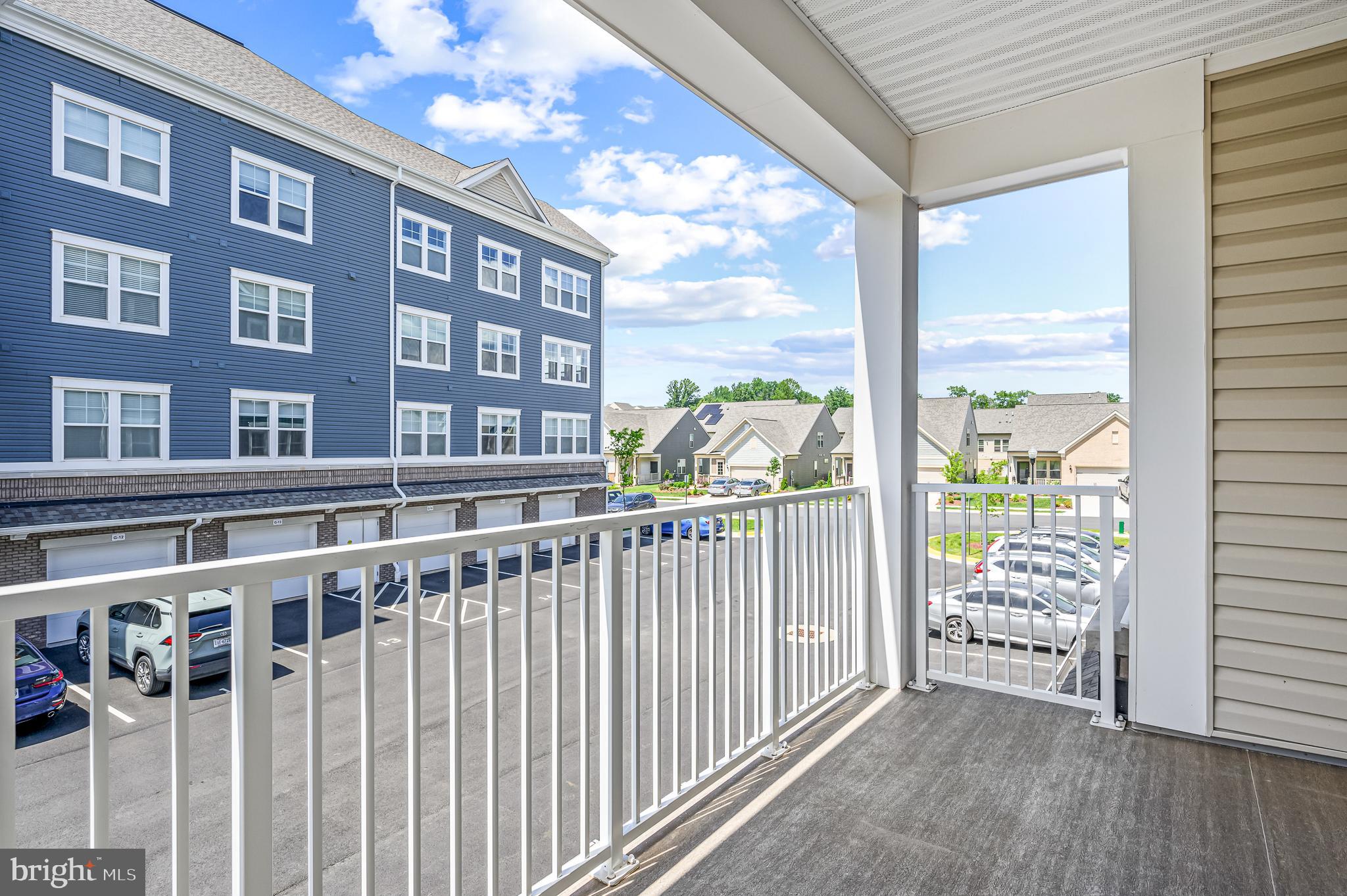 21894 Hawksbill High Circle, Unit 201 Sterling, VA 20164 - Photo 21 of 54 View of Community From Balcony