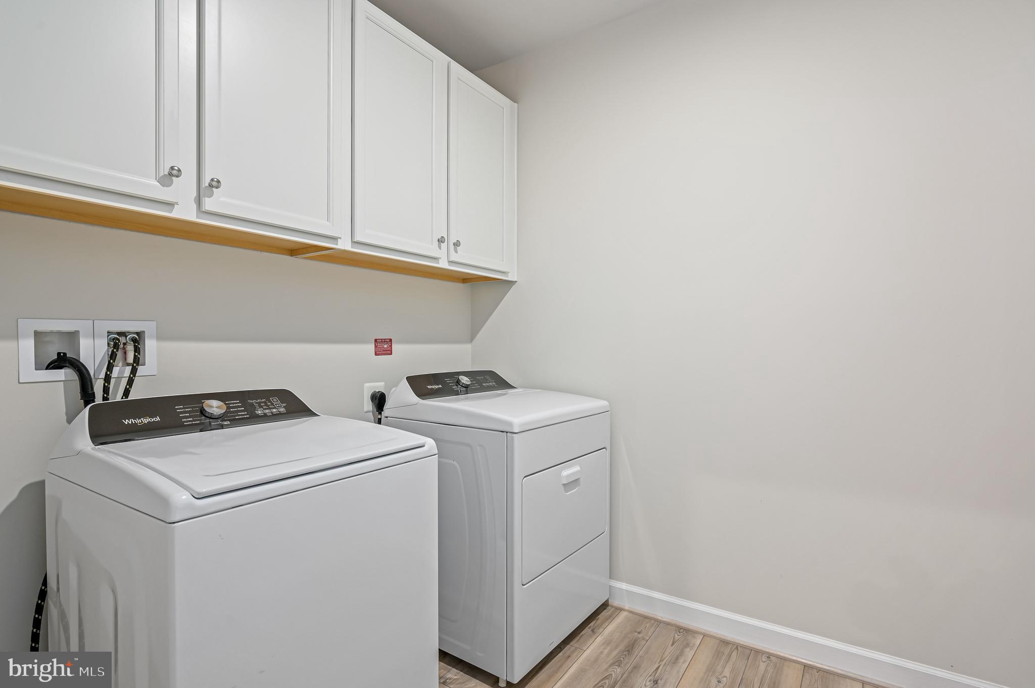 21894 Hawksbill High Circle, Unit 201 Sterling, VA 20164 - Photo 26 of 54 Laundry room with storage