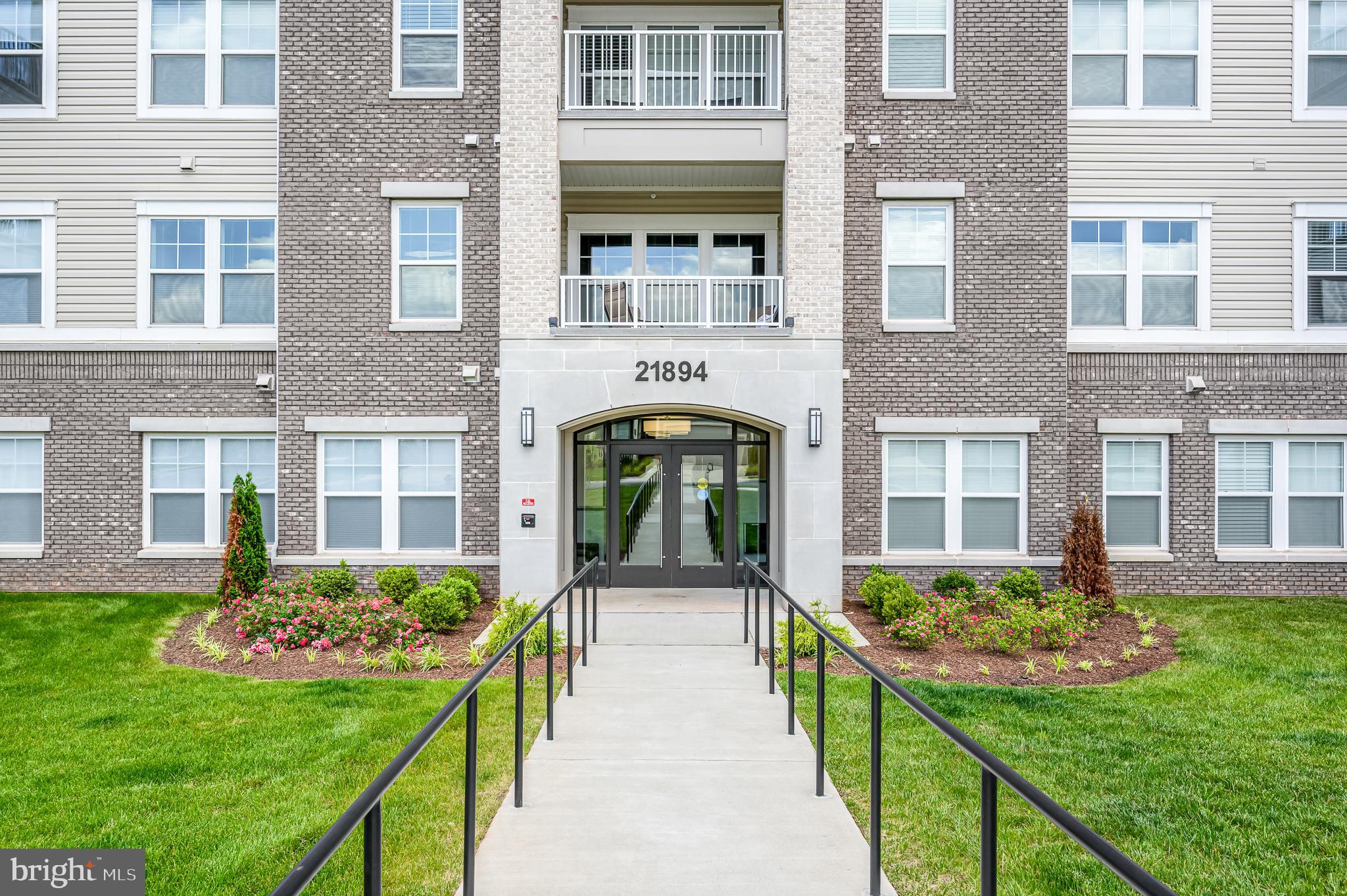 21894 Hawksbill High Circle, Unit 201 Sterling, VA 20164 - Photo 36 of 54 Front Exterior