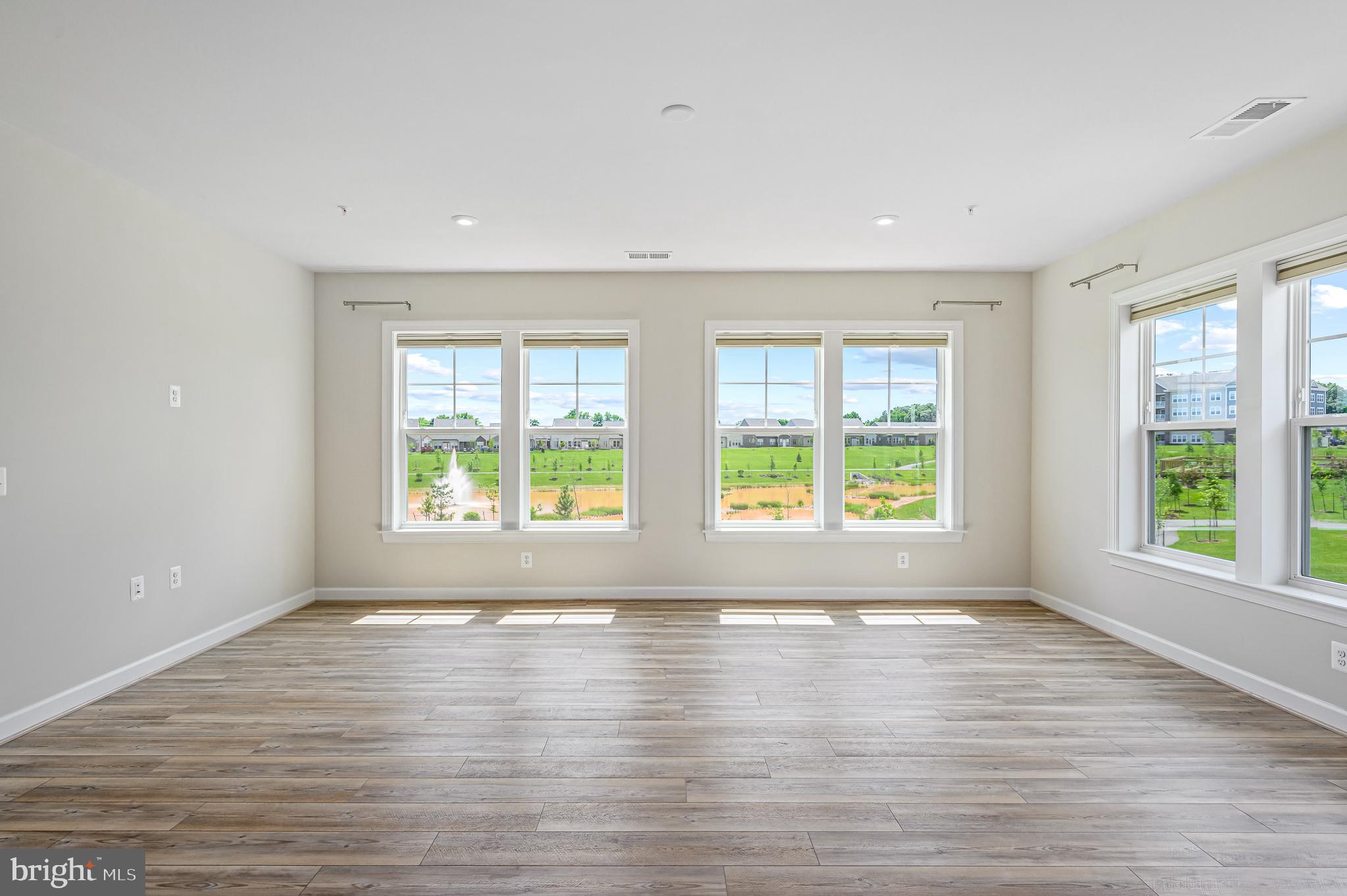 21894 Hawksbill High Circle, Unit 201 Sterling, VA 20164 - Photo 10 of 54 Living/Dining Area