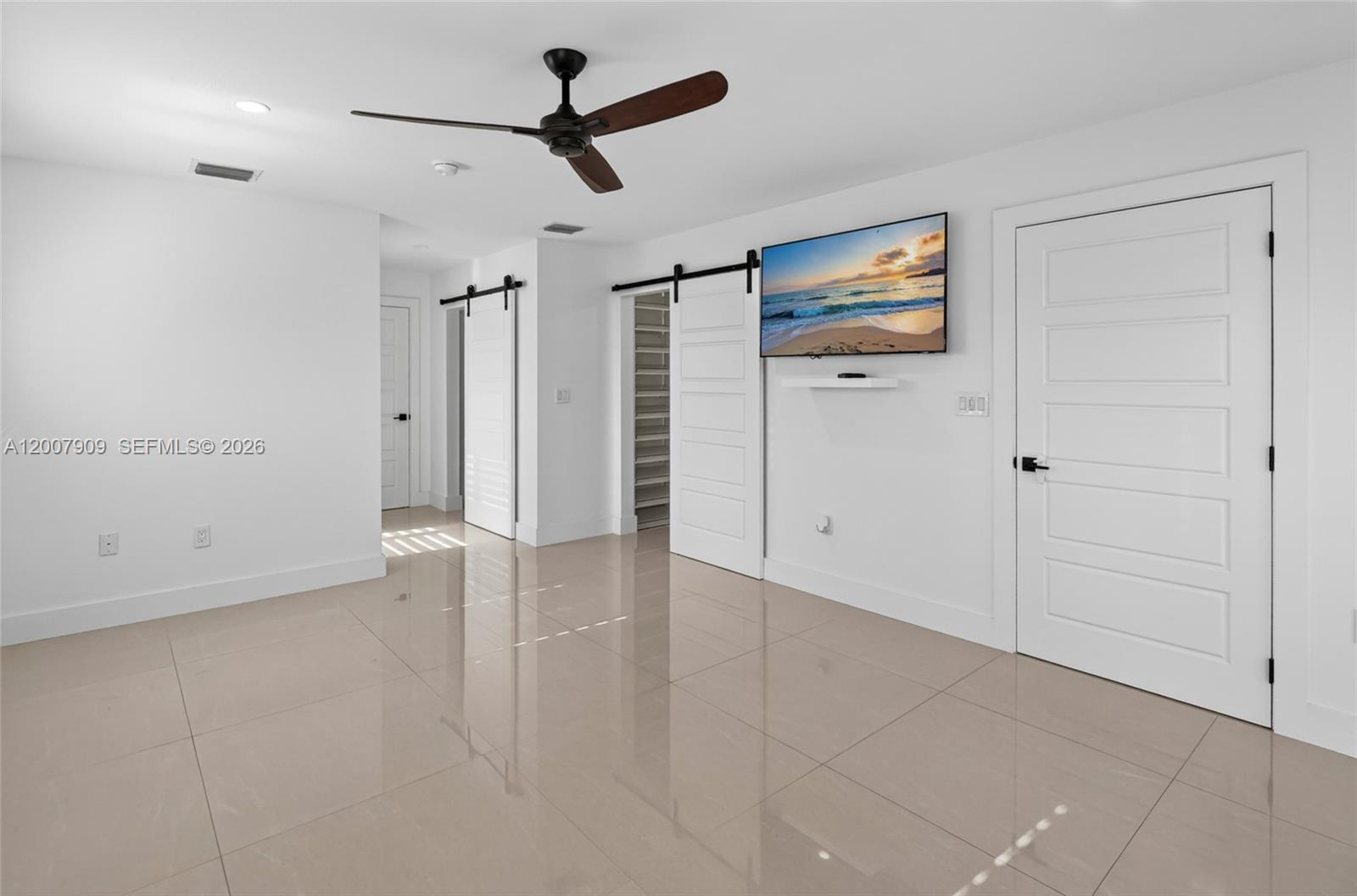 4865 Southwest 94th Avenue Miami, FL 33165 - Photo 19 of 32 wooden floor in an empty room