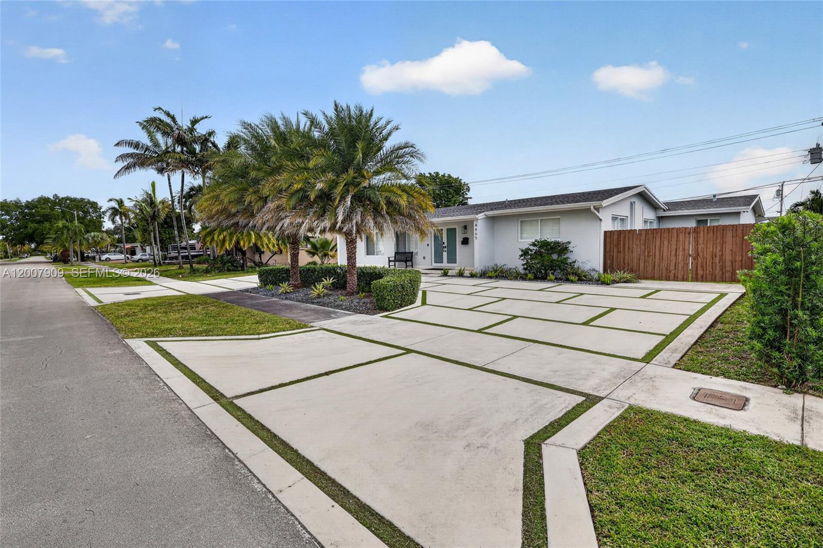 4865 Southwest 94th Avenue Miami, FL 33165 - Photo 2 of 32 a view of a house with a patio