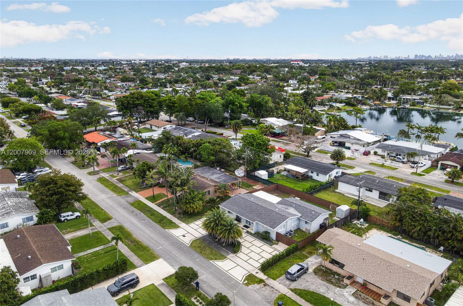 4865 Southwest 94th Avenue Miami, FL 33165 - Photo 30 of 32 an aerial view of residential houses with outdoor space