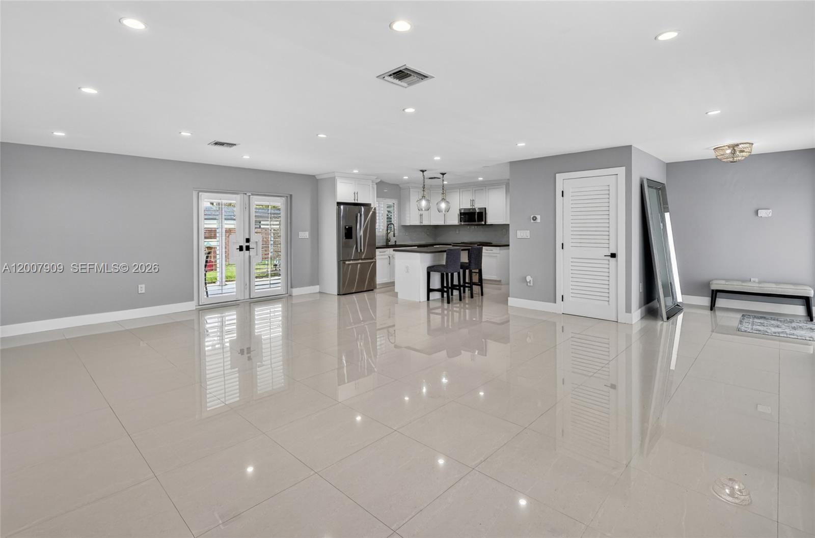 4865 Southwest 94th Avenue Miami, FL 33165 - Photo 6 of 32 a view of a kitchen with dining area