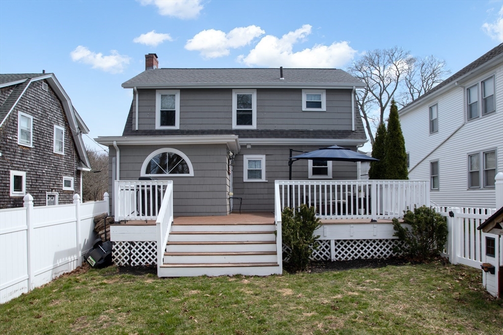 32 Oakland Street Fall River, MA 02720 - Photo 11 of 35 a front view of a house with a garden