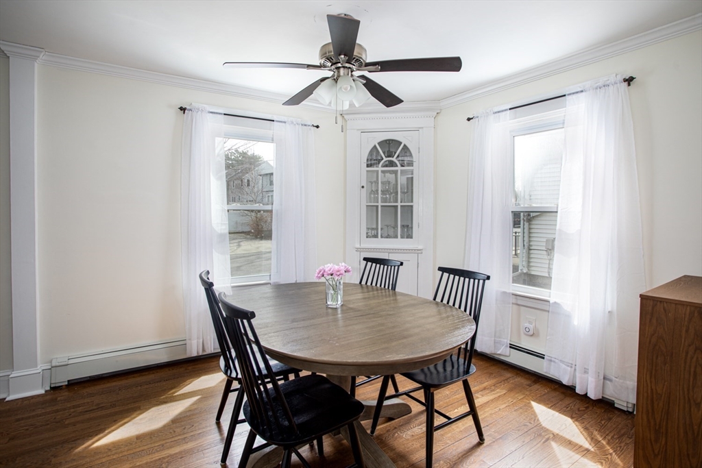 32 Oakland Street Fall River, MA 02720 - Photo 14 of 35 a view of a dining room with furniture window and wooden floor