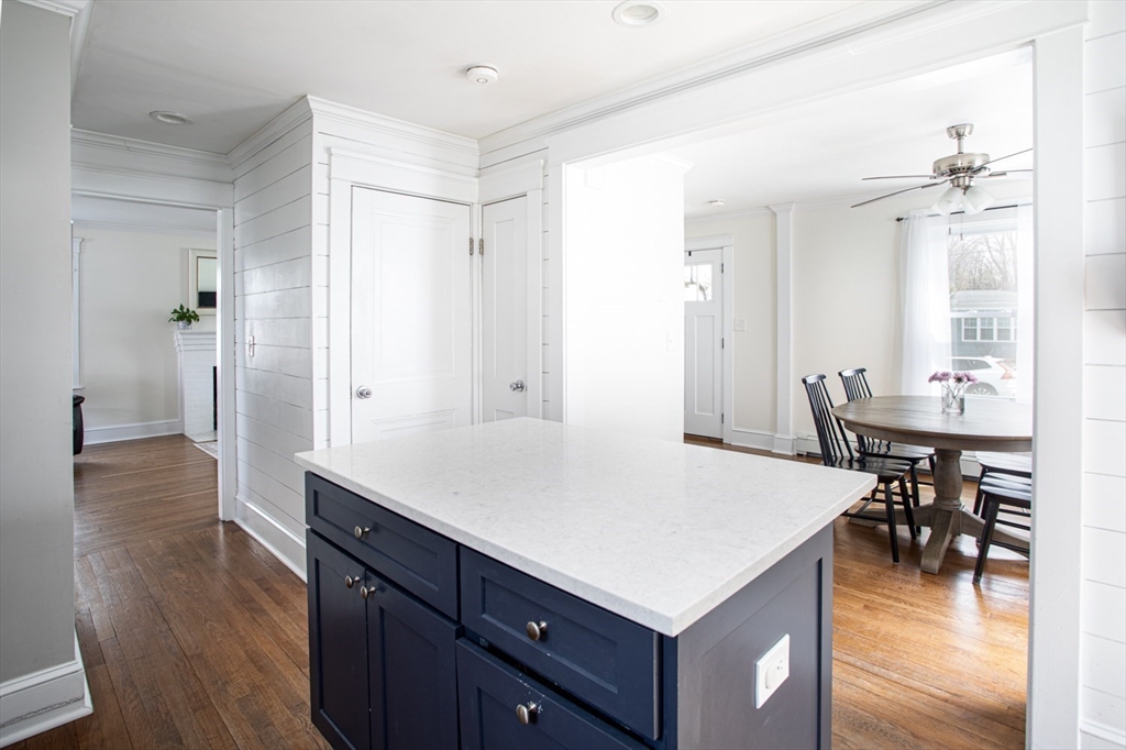 32 Oakland Street Fall River, MA 02720 - Photo 18 of 35 a kitchen with a table and chairs