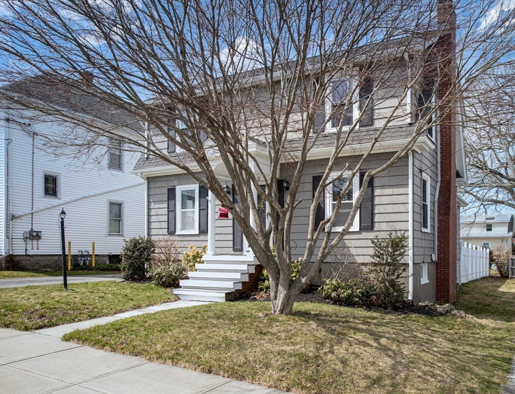 32 Oakland Street Fall River, MA 02720 - Photo 2 of 35 a view of a house with a yard