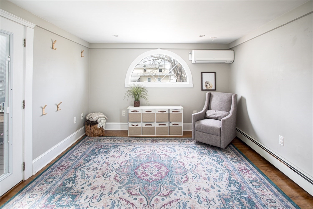 32 Oakland Street Fall River, MA 02720 - Photo 23 of 35 a living room with furniture and a large window