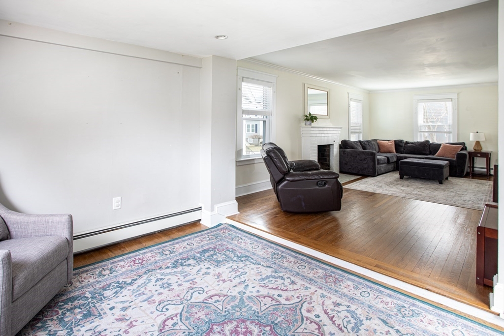 32 Oakland Street Fall River, MA 02720 - Photo 24 of 35 a living room with furniture and a rug