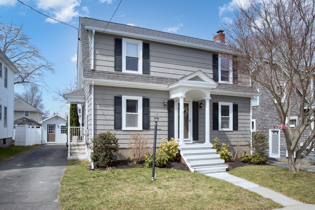 32 Oakland Street Fall River, MA 02720 - Photo 3 of 35 a front view of a house with garden