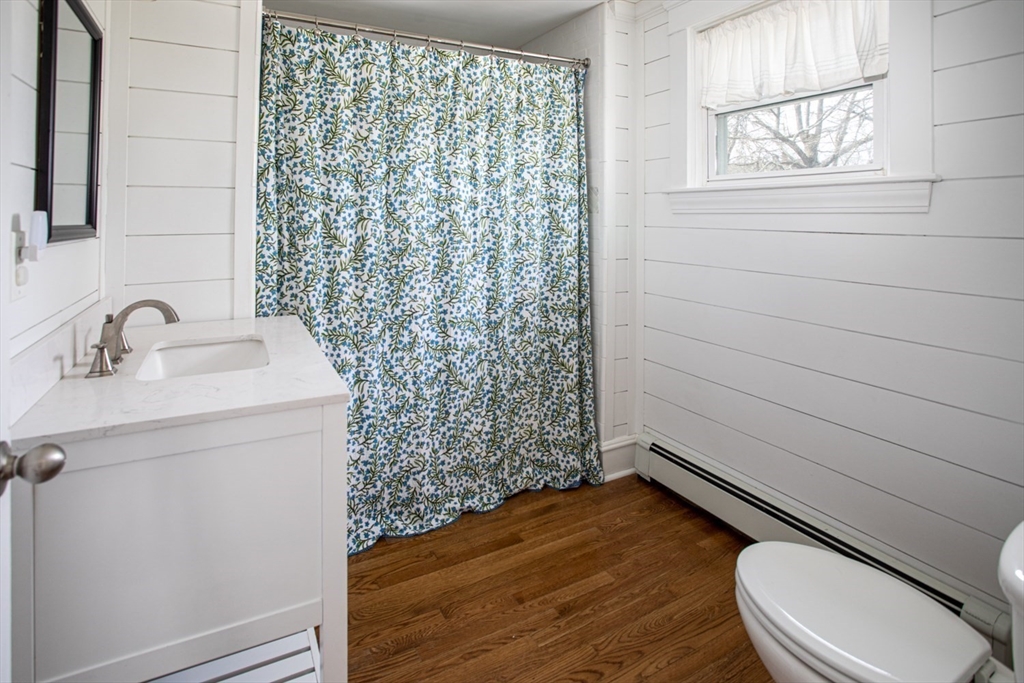 32 Oakland Street Fall River, MA 02720 - Photo 32 of 35 a bathroom with a sink toilet and shower