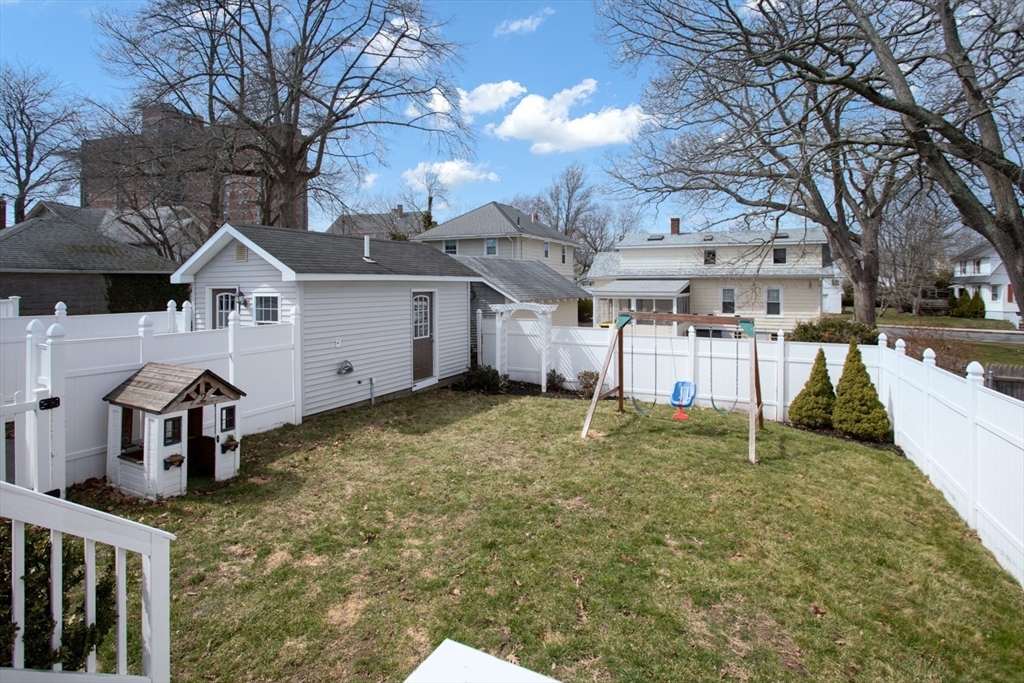 32 Oakland Street Fall River, MA 02720 - Photo 8 of 35 a house that has a tree in front of it