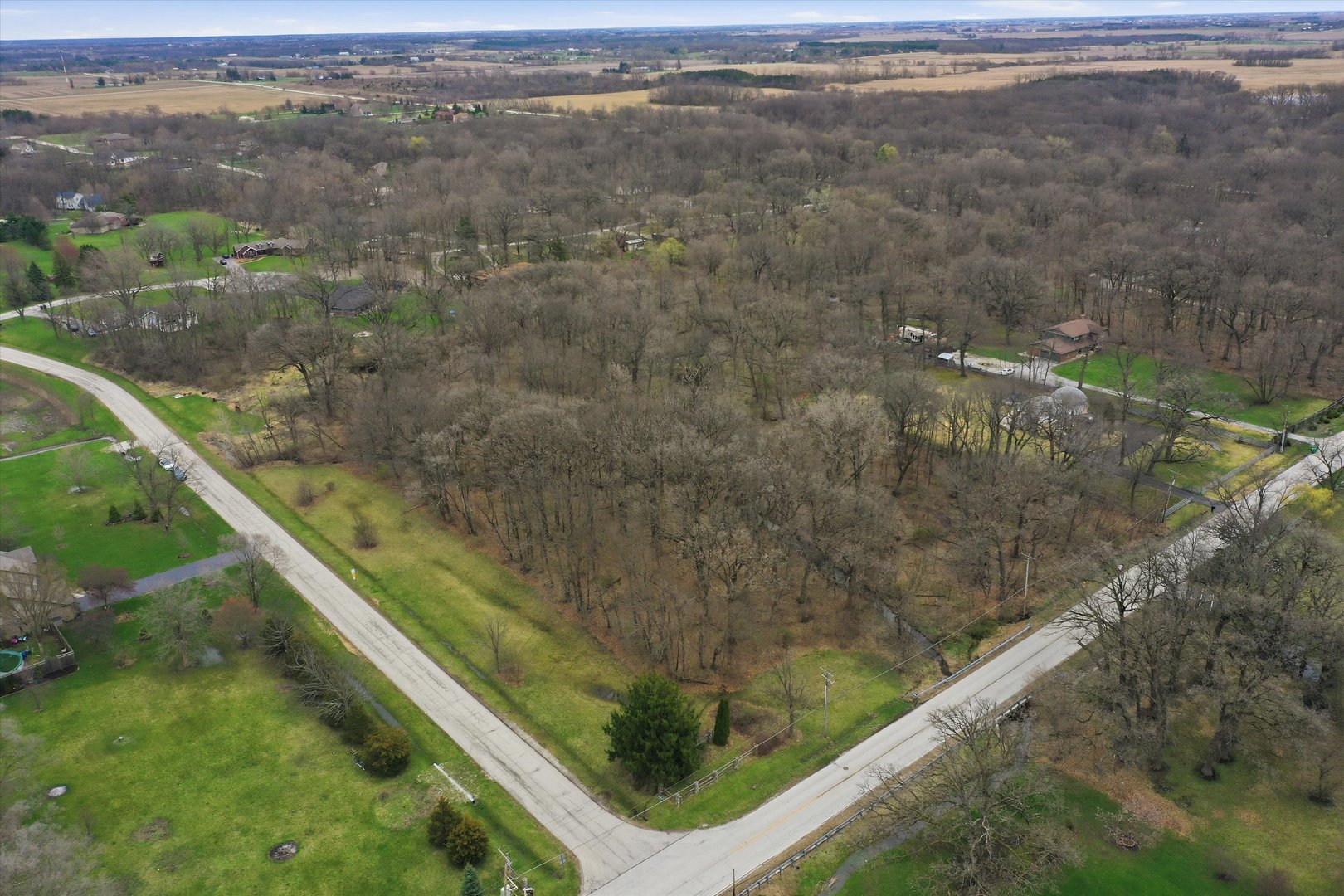 5525 West Heatherbrook Trail Monee, IL 60449 - Photo 1 of 20 a view of a lake from a balcony