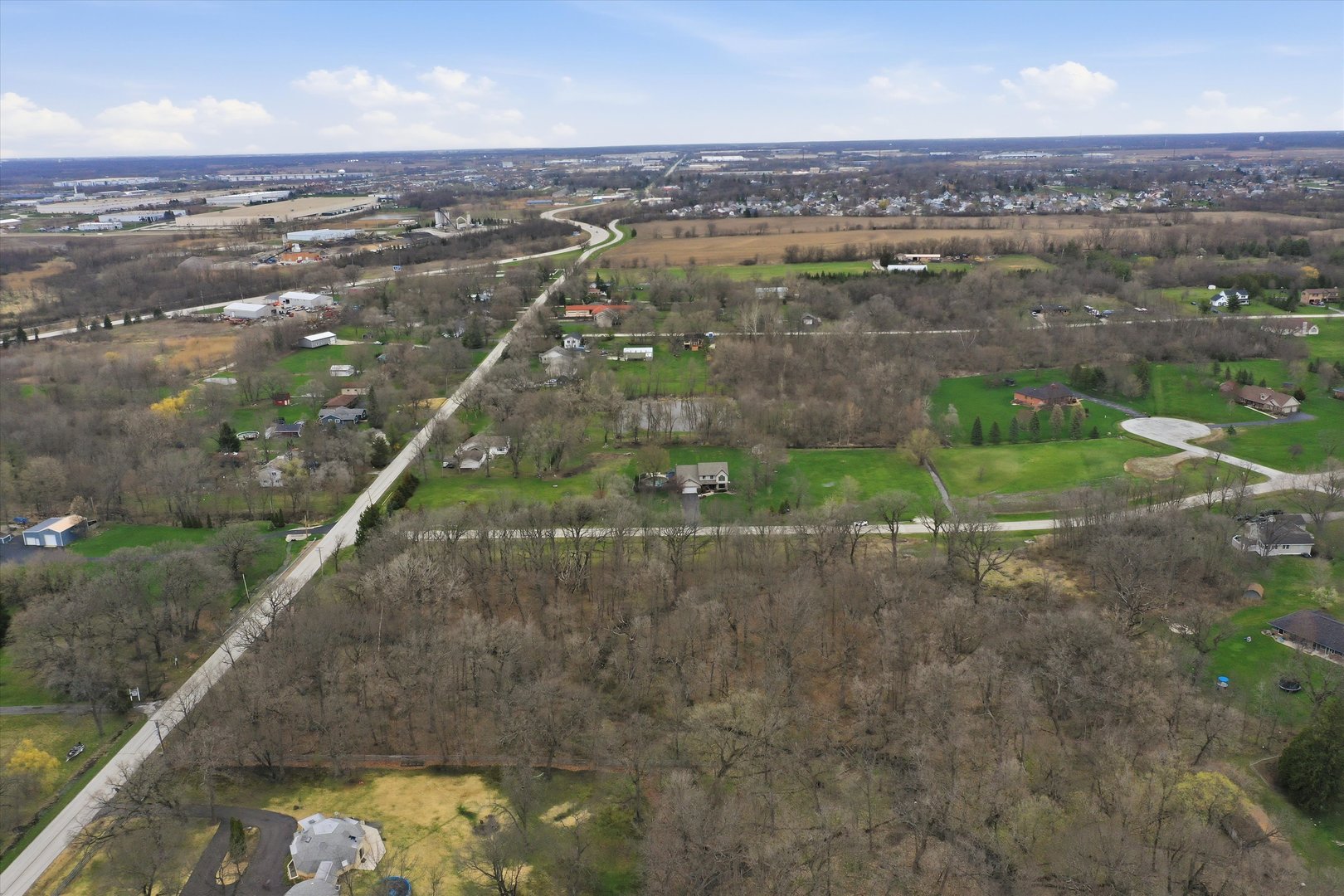 5525 West Heatherbrook Trail Monee, IL 60449 - Photo 17 of 20 an aerial view of a houses with a yard