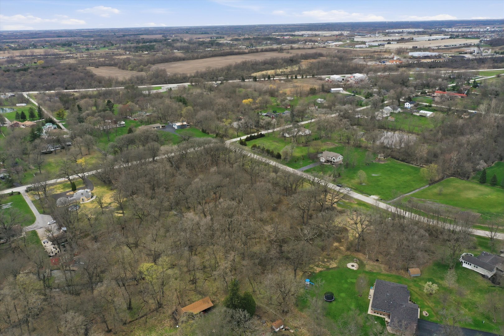 5525 West Heatherbrook Trail Monee, IL 60449 - Photo 18 of 20 an aerial view of residential houses with outdoor space