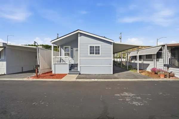 a front view of a house with a garage