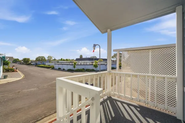 a view of a balcony with city view