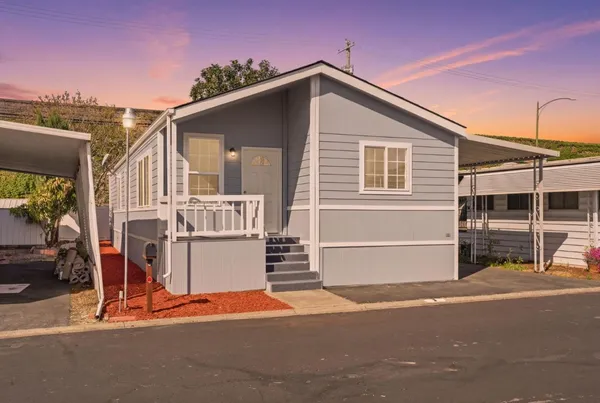 a front view of a house with a garage