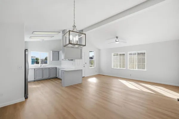 a view of kitchen and windows