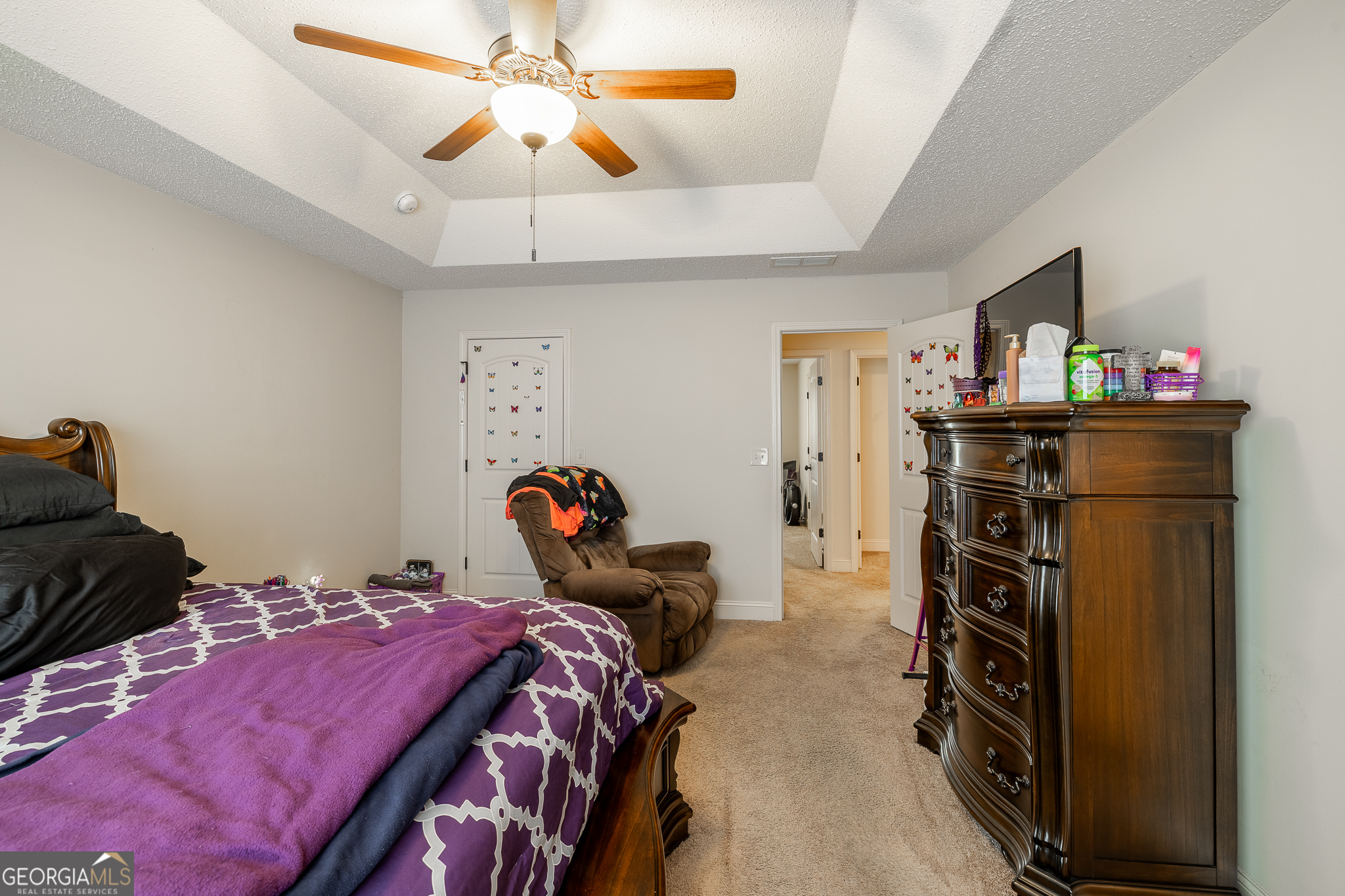 105 Stonebrooke Drive Colbert, GA 30628 - Photo 13 of 26 a bed room with a bed and a tv