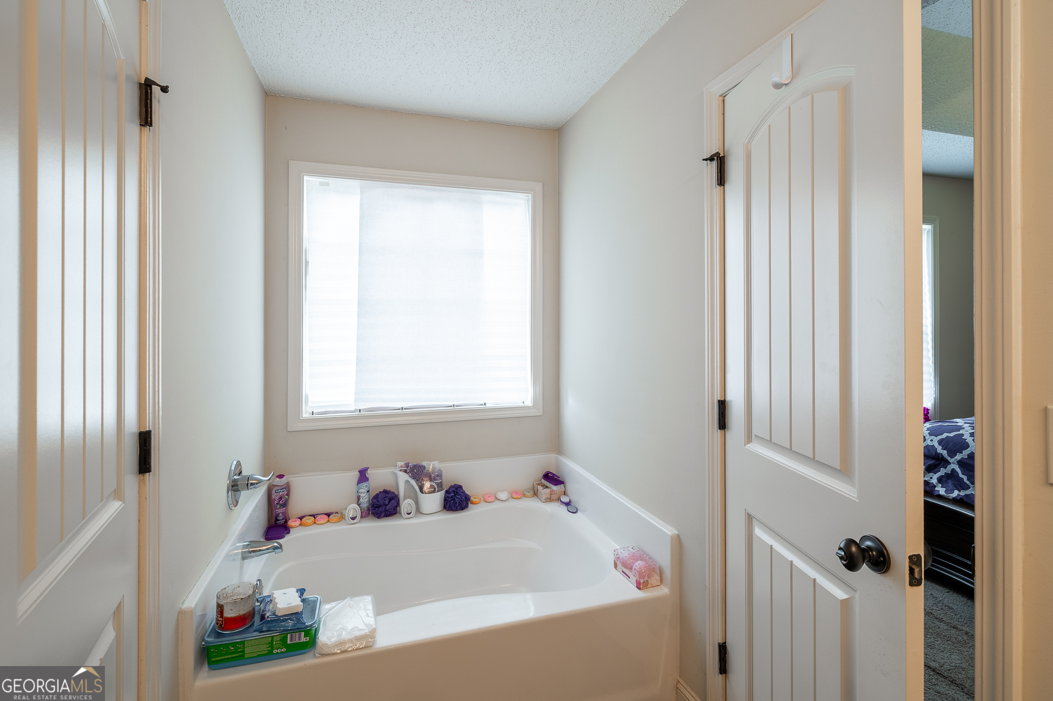 105 Stonebrooke Drive Colbert, GA 30628 - Photo 14 of 26 a bathroom with a bathtub and shower